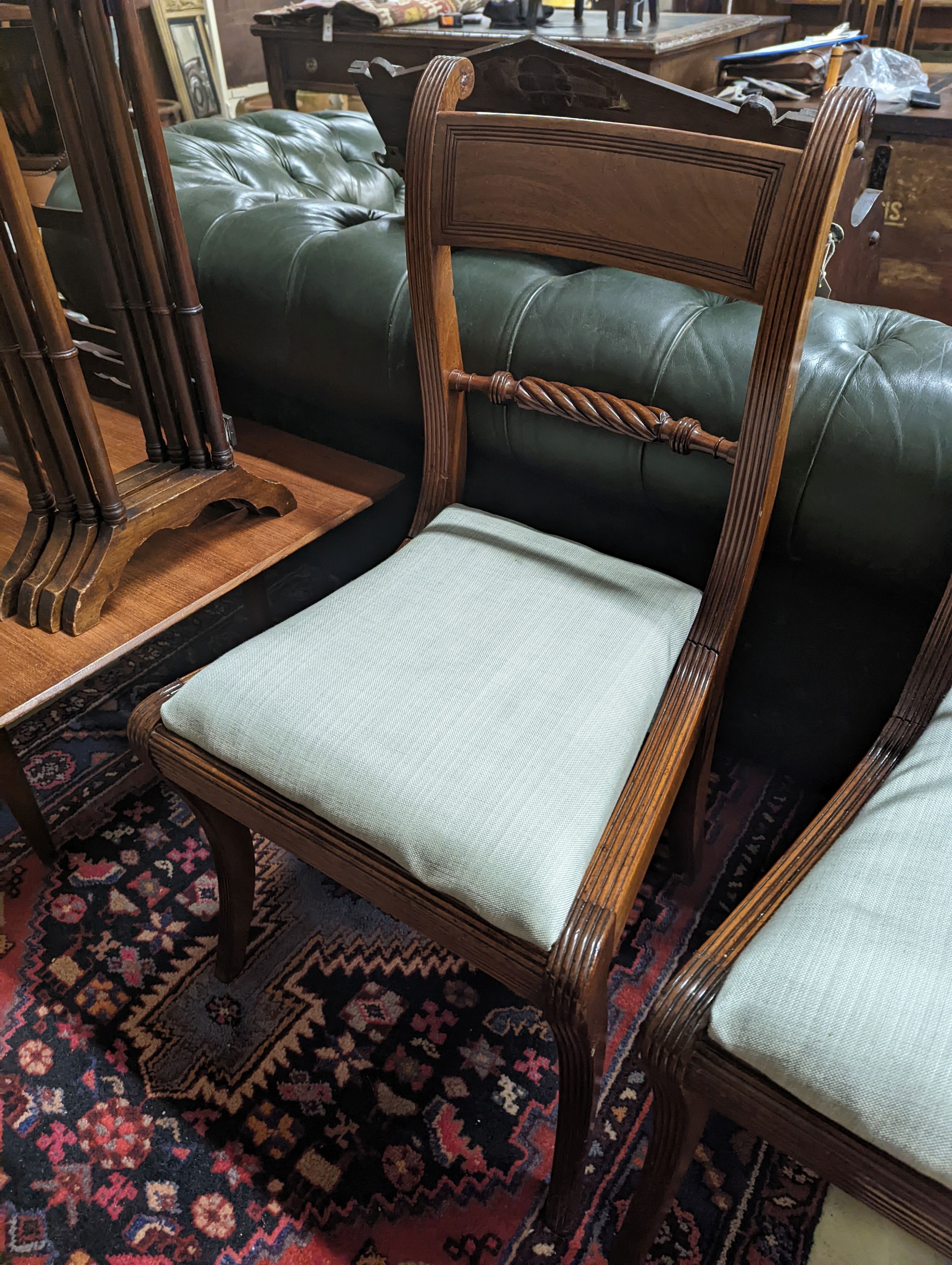 A set of six Regency mahogany dining chairs with rope twist backs